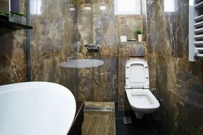 a bathroom with a toilet and a sink at Lux apartmani Beograd in Belgrade