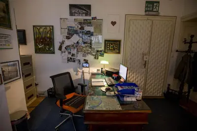 an office with a desk with a computer on it at Sun Hostel in Belgrade