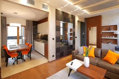 a living room with a couch and a table at Hotel Passpartù Home Garni in Belgrade