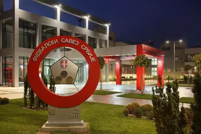 a large red circle sign in front of a building at Hotel Srbija Lux in Stara Pazova