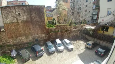 a group of cars parked in a parking lot at Apartment Harmonija in Belgrade