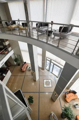 an overhead view of a lobby with chairs and tables at Hotel Zeder Garni in Belgrade