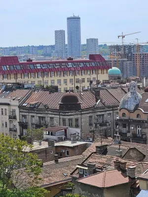 an overhead view of a city with buildings and roofs at Matea apartman in Belgrade