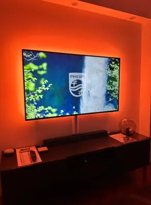 a flat screen tv sitting on top of a desk at Cherrycity apartments in Belgrade
