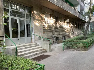 a building with a door and stairs in front of it at Cherrycity apartments in Belgrade