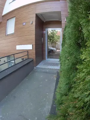 an entrance to a building with a glass door at M48 apartments in Belgrade
