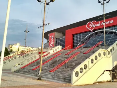 a baseball stadium with stairs in front of it at Arena Relax Apartman in Belgrade
