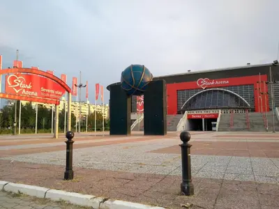 a basketball court in front of a building at Arena Relax Apartman in Belgrade
