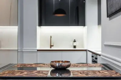 a kitchen with a bowl on top of a counter at Max Central Apartment in Belgrade