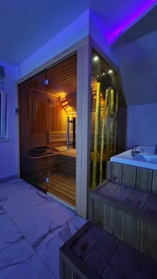 a large bathroom with a tub and a sink at Vila Argola - Spa Luxury Apartments in Belgrade