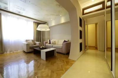 a living room with a couch and a table at Apartment Piano in Belgrade