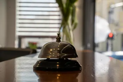 a helmet is sitting on top of a table at Akacija Luxury Suites- Zemunski kej in Belgrade