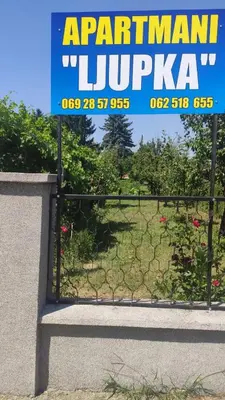 a gate with a sign that reads argentinian istg sqor at Apartment Ljupka in Pančevo