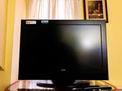 a flat screen tv sitting on top of a table at Vila Aleksandar in Smederevo