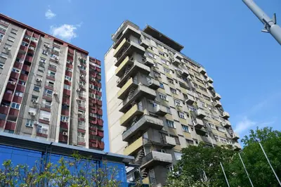 a tall building with balconies on the side of it at Apartment 36 in Belgrade