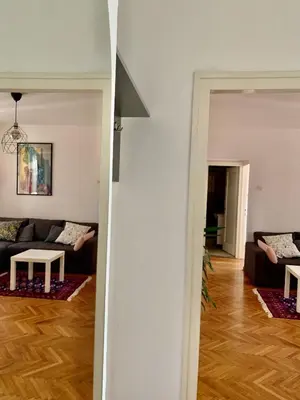 a living room with a couch and a table at Star apartment in Belgrade