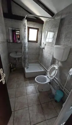 a bathroom with a toilet and a sink at Julijana in Belgrade