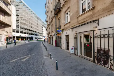 an empty street in a city with buildings at SnowWhite New Apartment in Belgrade