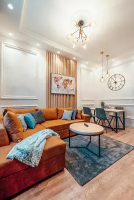 a living room with a couch and a table at Miha Luxury Apartment in Belgrade