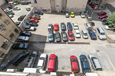 an aerial view of cars parked in a parking lot at Belgrade Center Apartment II in Belgrade
