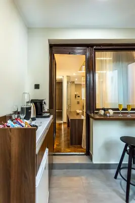 a kitchen with a counter and a kitchen with a sink at Onyx luxury apartments in Belgrade