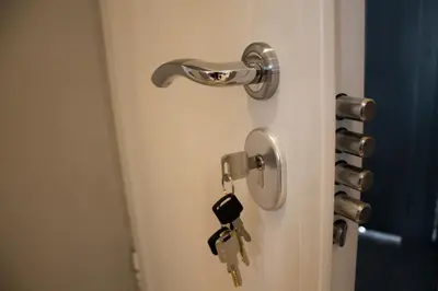 a door with a key hanging from it at Belgrade Downtown Residence in Belgrade