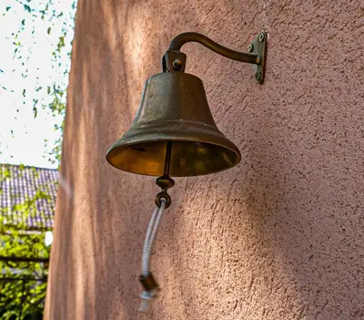 a bell on the side of a wall at Dunavska Kuća in Smederevo