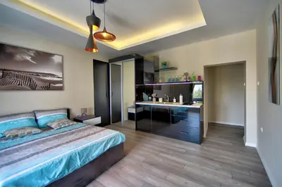a bedroom with a bed and a desk in it at Z&N luxury Belgrade appartment - city center in Belgrade