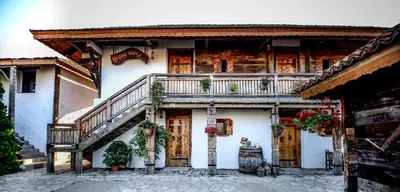 a building with a staircase on the side of it at Srpsko Andrejevo Selo in Belgrade