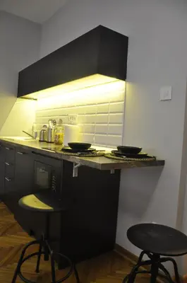 a kitchen with a counter with two bowls on it at Urban Studio in city center in Belgrade