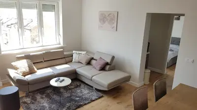 a living room with a couch and a table at Krunska 54 in Belgrade