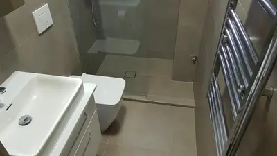 a bathroom with a white sink and a toilet at Krunska 54 in Belgrade