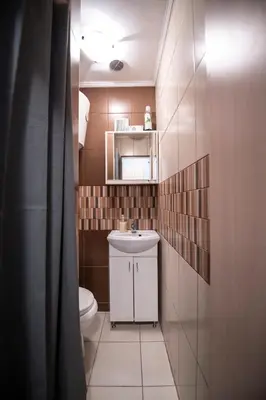 a small bathroom with a sink and a toilet at Marshal apartment in Belgrade