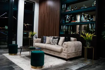 a living room with a couch and a table at Hotel Ub Business & Wellness in Ub