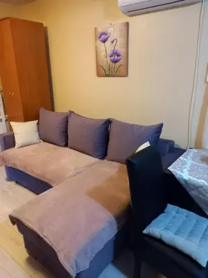 a living room with two beds and a couch at MaryAnne in Ledine