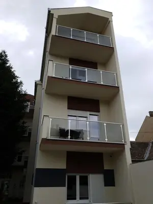 a building with balconies on the side of it at Konak Kutko in Pančevo