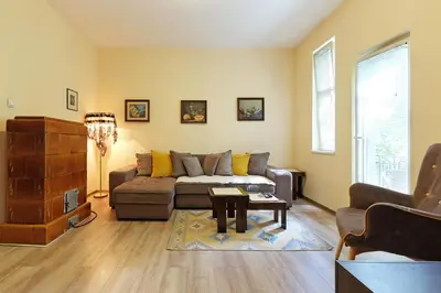 a living room with a couch and a table at Apartment Paradise Sunny Home in Belgrade