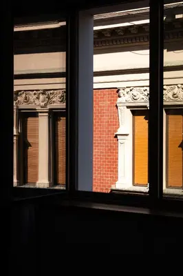 a view of a building through a window at Boutique Hotel Museum in Belgrade