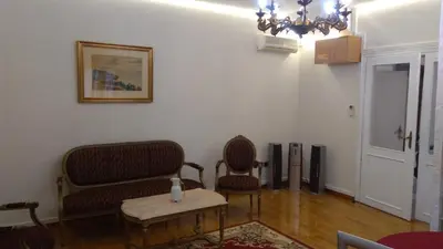 a living room with two chairs and a table at Resident hill resort in Belgrade