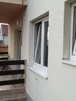 a window on the side of a house at Apartment Teodora in Belgrade