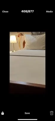a picture of a bed with a lamp on it at Monia Dream Apartment - Belgrade Lake & Fair in Belgrade