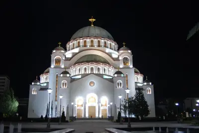 a large cathedral building with a domed roof at night at Belvedere city center apartment in Belgrade