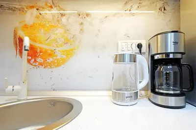 a coffee maker sitting on top of a counter at Apartment Paradise SunShine in Belgrade