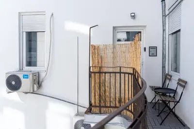 a room with a drying rack and a window at Brigitte's Central in Belgrade