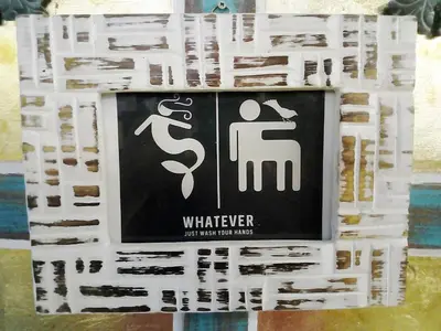 a sign that sayswhatever is not true for toilets at NapPARK Hostel in Belgrade