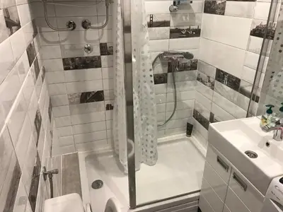 a bathroom with a shower and a sink at Lovely Apartment 2 in Belgrade
