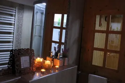 a room with candles on a counter next to a window at Villa Skadarlija in Belgrade