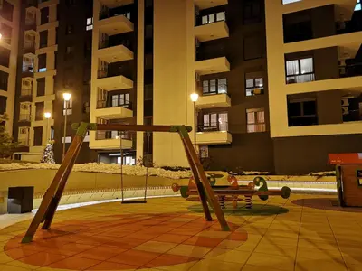 an empty playground in a city at night at NIKLUK in Belgrade