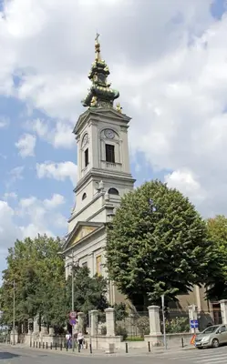 a tall white tower with a clock on it at Apartment No1 in Belgrade
