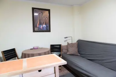 a living room with a couch and a table at House of Vracar in Belgrade